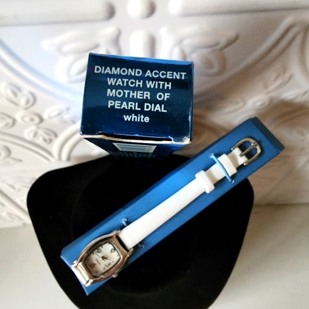 VINTAGE Avon- Diamond Accent Watch With Mother of Pearl Dial in White